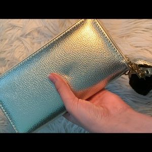 Gold clutch with Pom Pom keychain